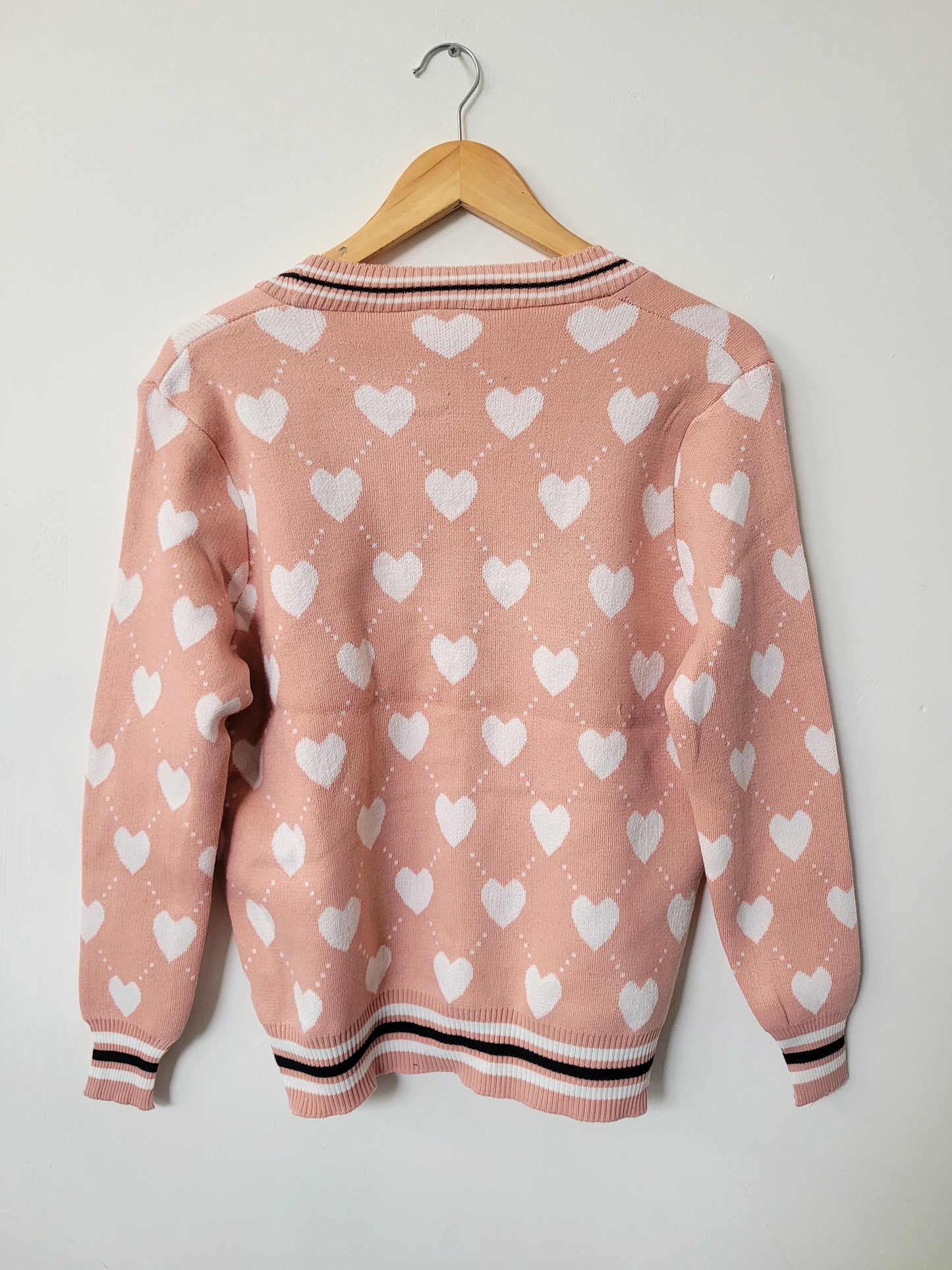 Cardigan corazones rosa palo