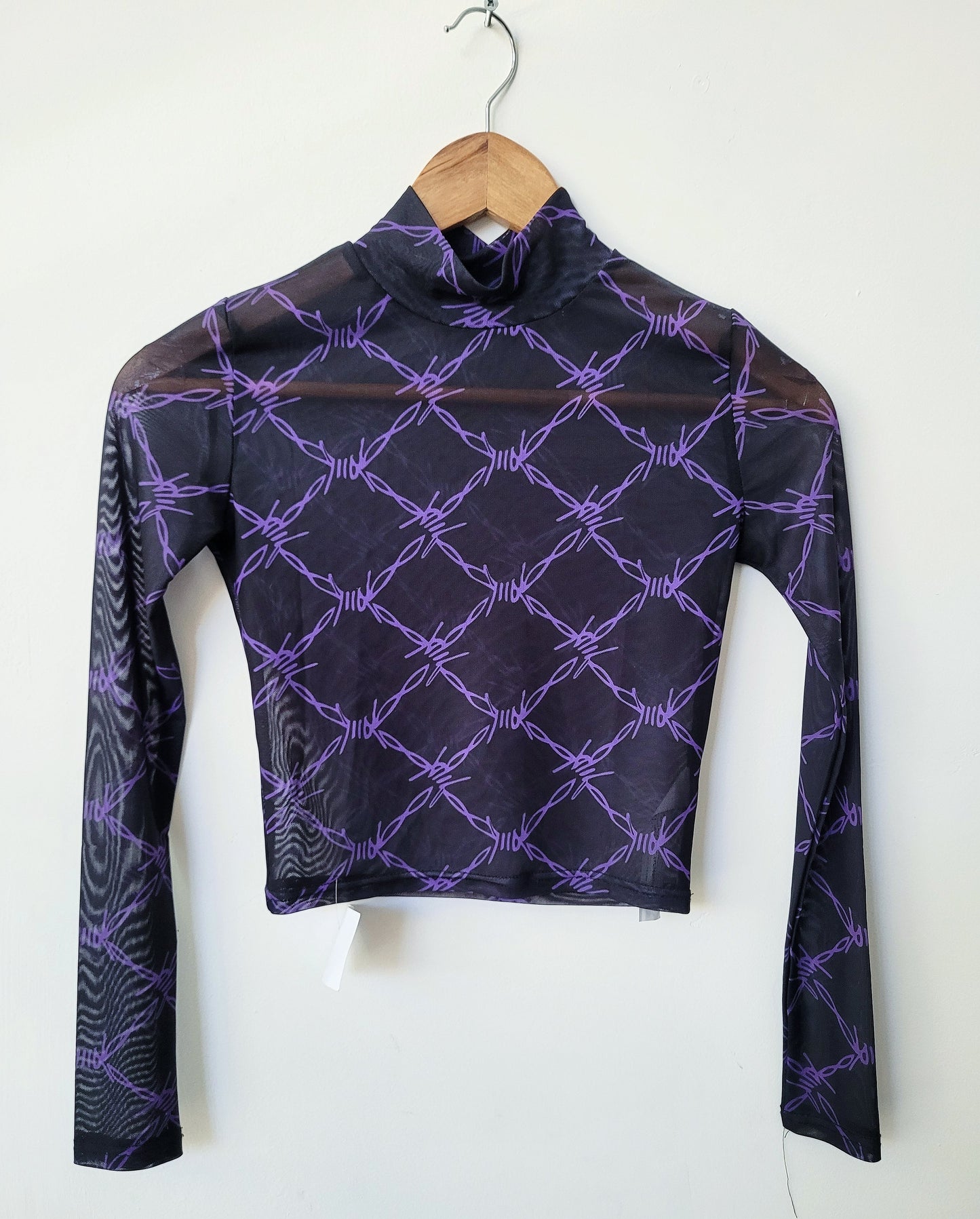 Top malla púas morada