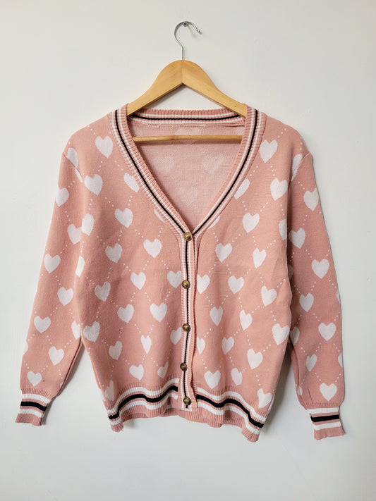 Cardigan corazones rosa palo
