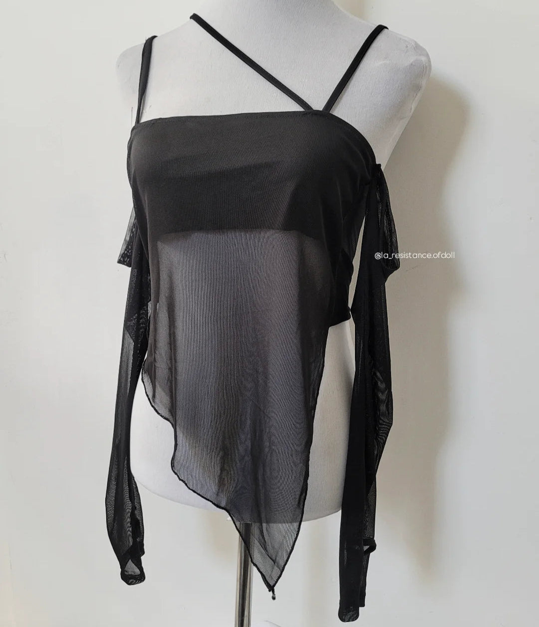 top asimetrico negro