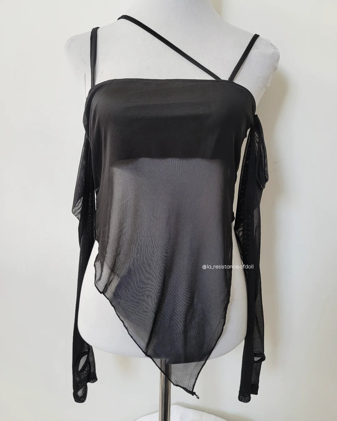 top asimetrico negro