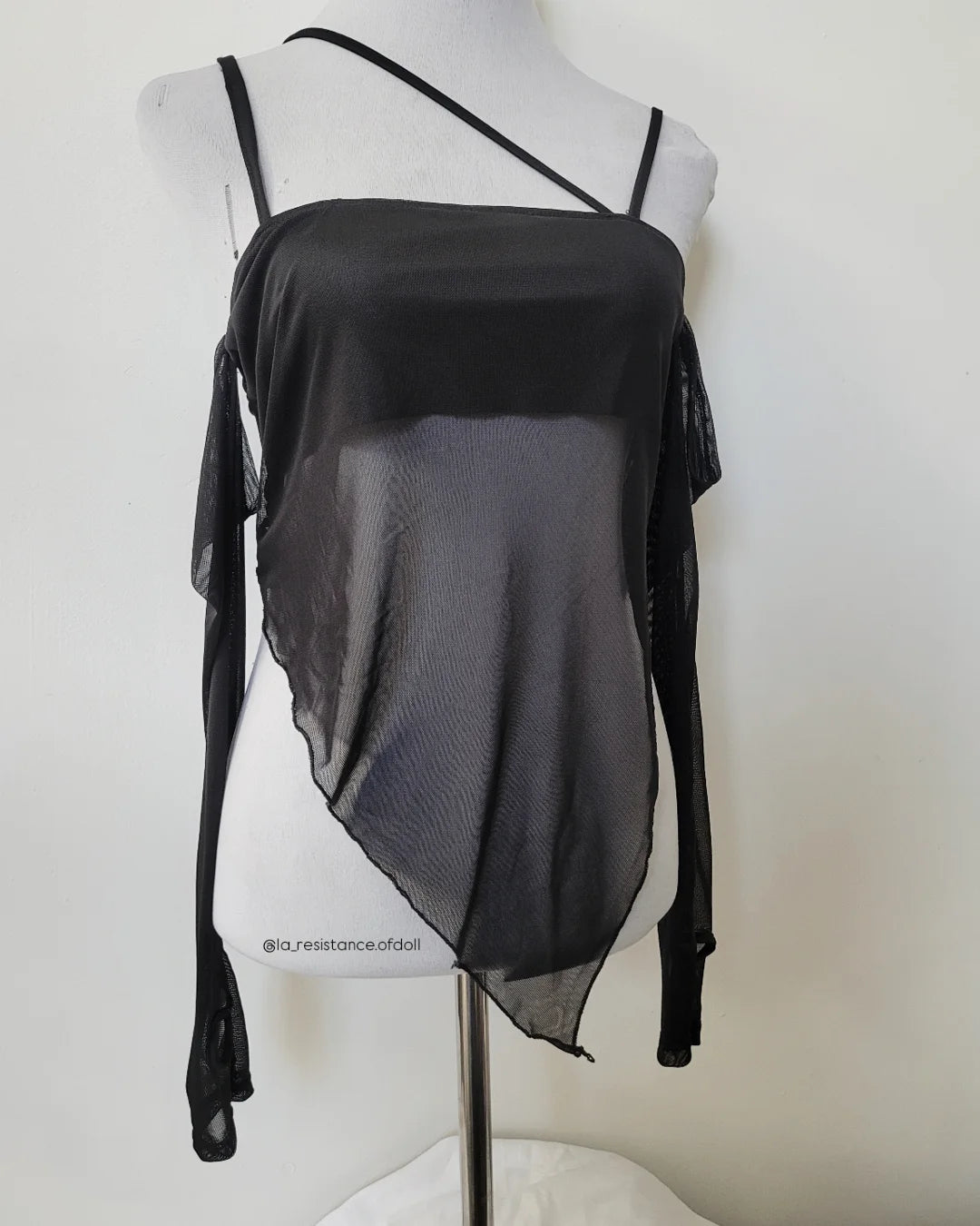 top asimetrico negro